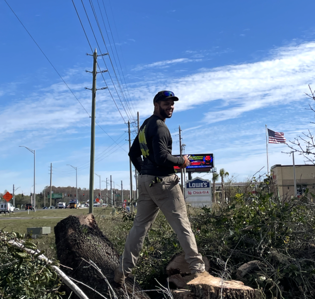Trevor Steinke on a Tampa job site after a tree removal